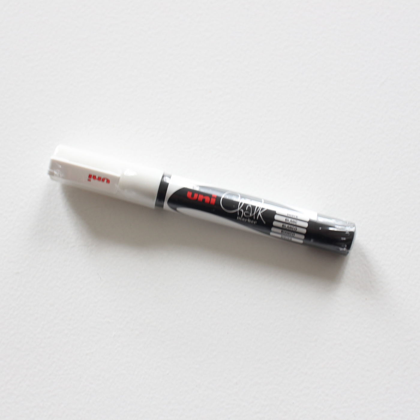 Nonpermanent Uniball chalk paint marker