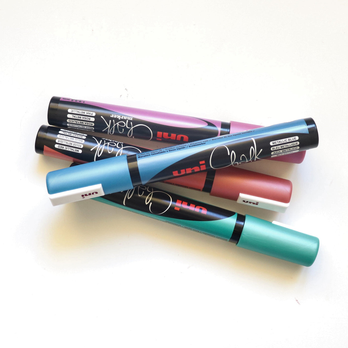 Metallic chalk paint markers in a stack