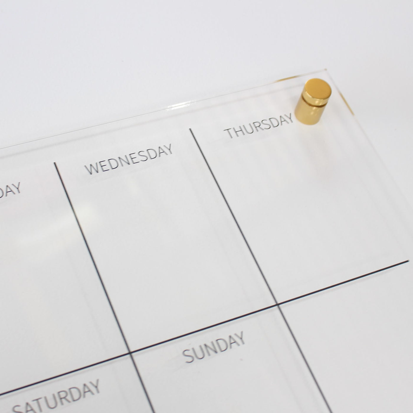 acrylic weekly wall planner with gold mounts