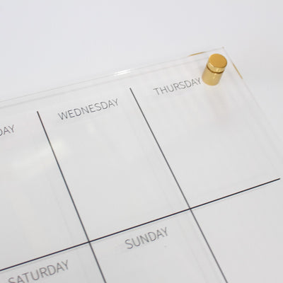 acrylic weekly wall planner with gold mounts